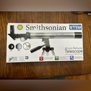 Smithsonian 40 mm telescope. Box never opened.